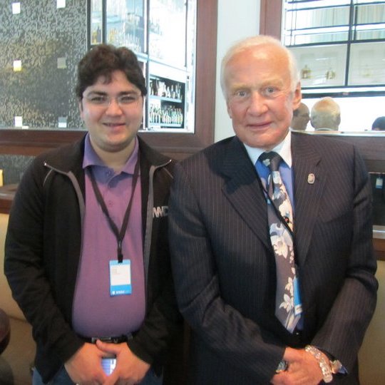 Anurag Rastogi seated beside Buzz Aldrin during WWDC week in 2011